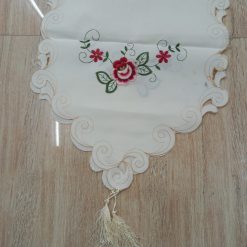 Alternative view of This elegant white cotton fabric table runner adds a touch of sophistication to any table setting.