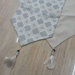 Alternative view of Introducing our multi color fabric table runner - a versatile and stylish addition to any table setting. Made from high-quality fabric