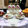Elegant Rose Garden Porcelain Tea Set 18-Piece with Gold Stand.