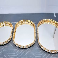 Alternative view of Oval Gold Trays with Mirrored Bases and Crystal Detailing