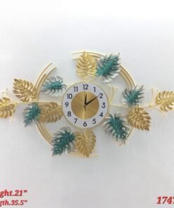 modern tropical monstera leaf wall clock