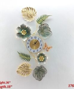 tropical monstera leaf and butterfly wall clock gold and green vertical metal art