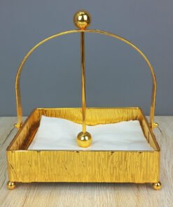 gold finish textured napkin holder with weighted arm