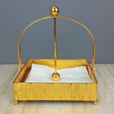 gold finish textured napkin holder with weighted arm