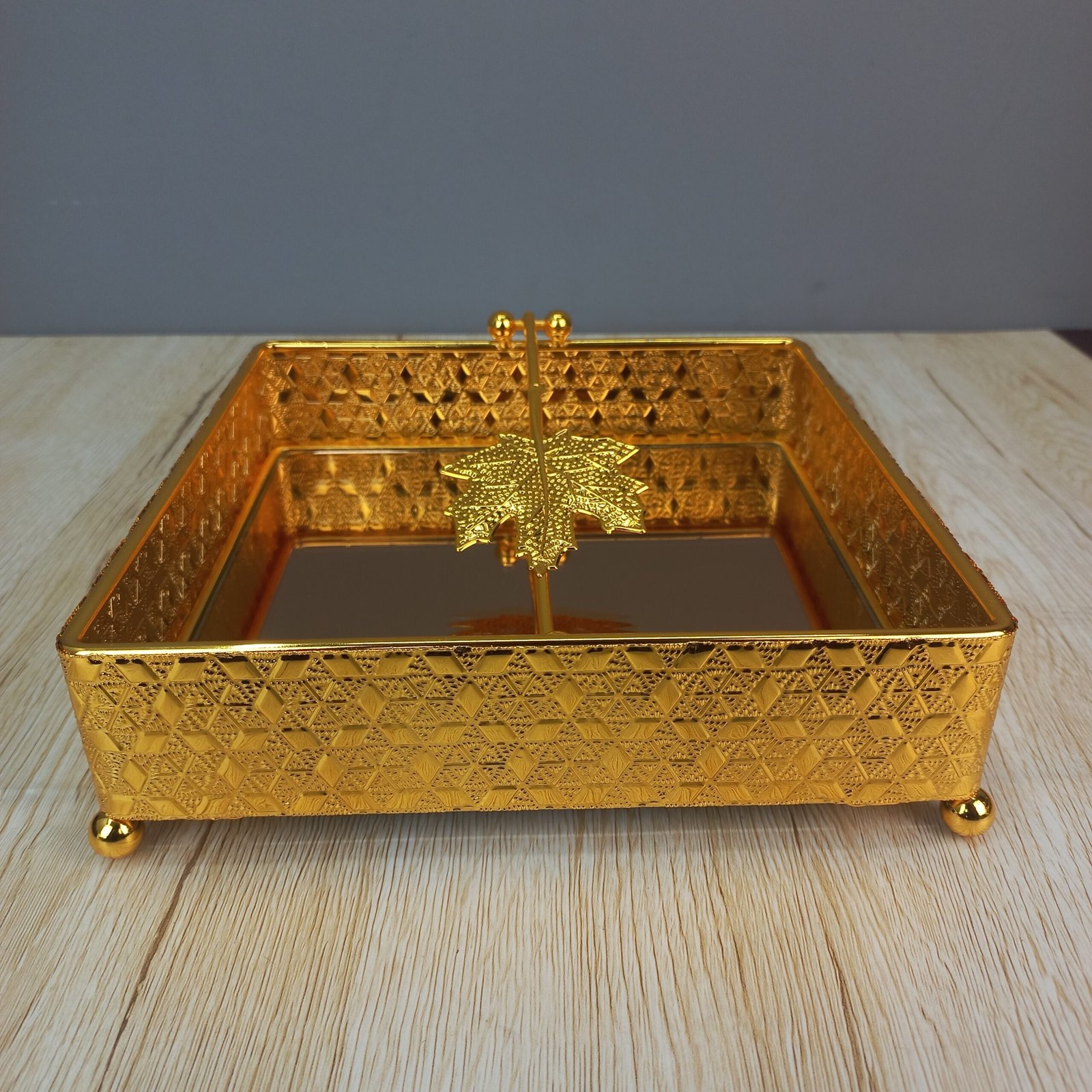 elegant gold plated square napkin holder with maple leaf weight elegant gold plated square napkin holder with maple leaf weight