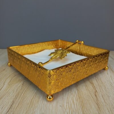 elegant gold plated square napkin holder with maple leaf weight