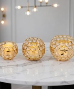 elegant gold crystal candle holder trio with greek key detailing