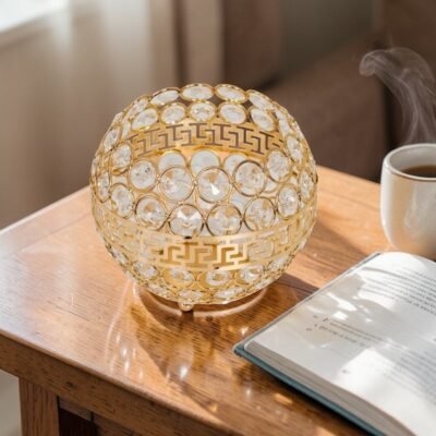 elegant gold crystal candle holder trio with greek key detailing