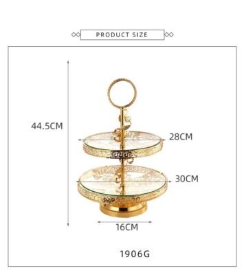 This luxurious 2-tier serving stand is a masterpiece of functional decor, designed to bring a regal touch to any table setting. With its intricate gold-plated metalwork and clear glass surfaces, it offers a sophisticated way to display pastries, appetizers, or jewelry.