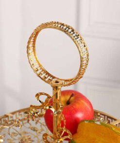 This luxurious 2-tier serving stand is a masterpiece of functional decor, designed to bring a regal touch to any table setting. With its intricate gold-plated metalwork and clear glass surfaces, it offers a sophisticated way to display pastries, appetizers, or jewelry.