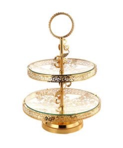 This luxurious 2-tier serving stand is a masterpiece of functional decor, designed to bring a regal touch to any table setting. With its intricate gold-plated metalwork and clear glass surfaces, it offers a sophisticated way to display pastries, appetizers, or jewelry.