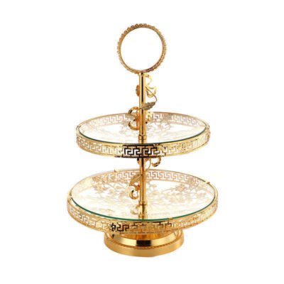 This luxurious 2-tier serving stand is a masterpiece of functional decor, designed to bring a regal touch to any table setting. With its intricate gold-plated metalwork and clear glass surfaces, it offers a sophisticated way to display pastries, appetizers, or jewelry.