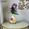 ornate 3d floral ceramic vase with iridescent pearl finish