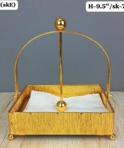gold finish textured napkin holder with weighted arm