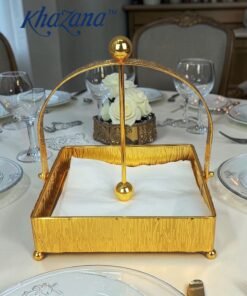 gold finish textured napkin holder with weighted arm
