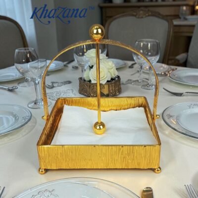 gold finish textured napkin holder with weighted arm