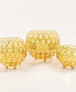 elegant gold crystal candle holder trio with greek key detailing