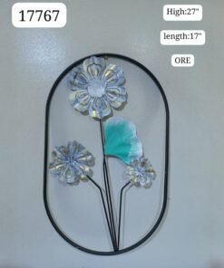 artistic grey and gold metal flower wall decor with teal leaf