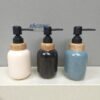 nordic ceramic soap dispenser set with bamboo accents