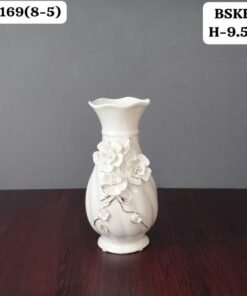 elegant white ceramic flower vase with 3d floral relief elegant white ceramic flower vase with 3d floral relief