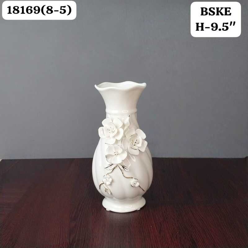 elegant white ceramic flower vase with 3d floral relief elegant white ceramic flower vase with 3d floral relief