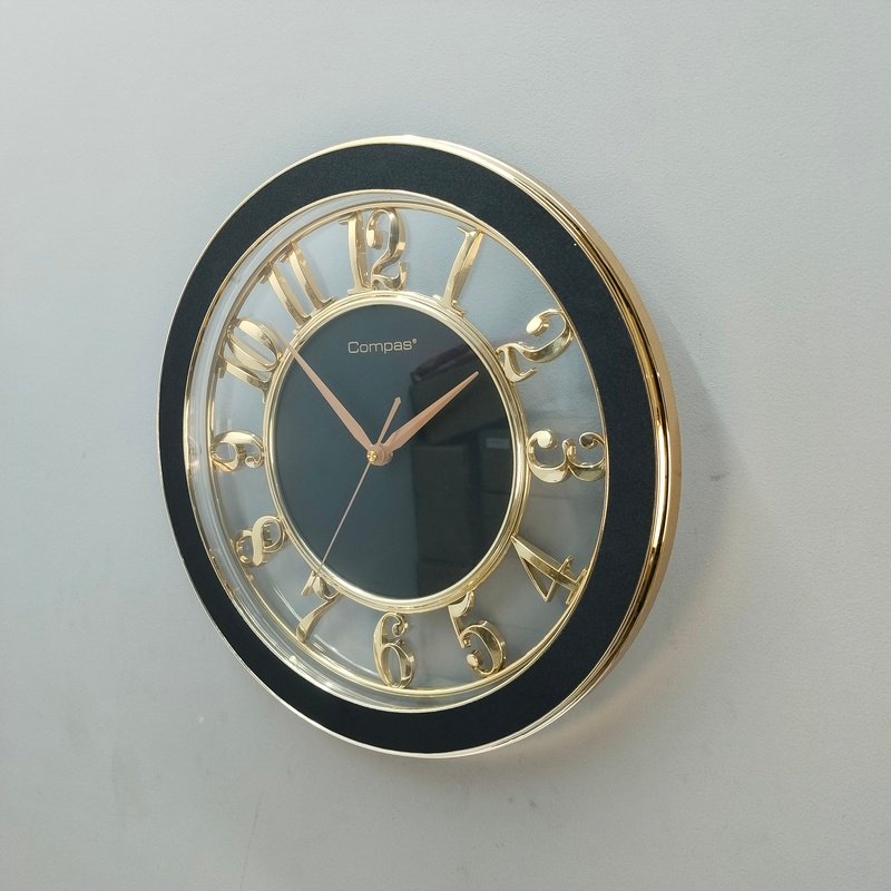 modern black & gold floating numeral wall clock modern black & gold floating numeral wall clock