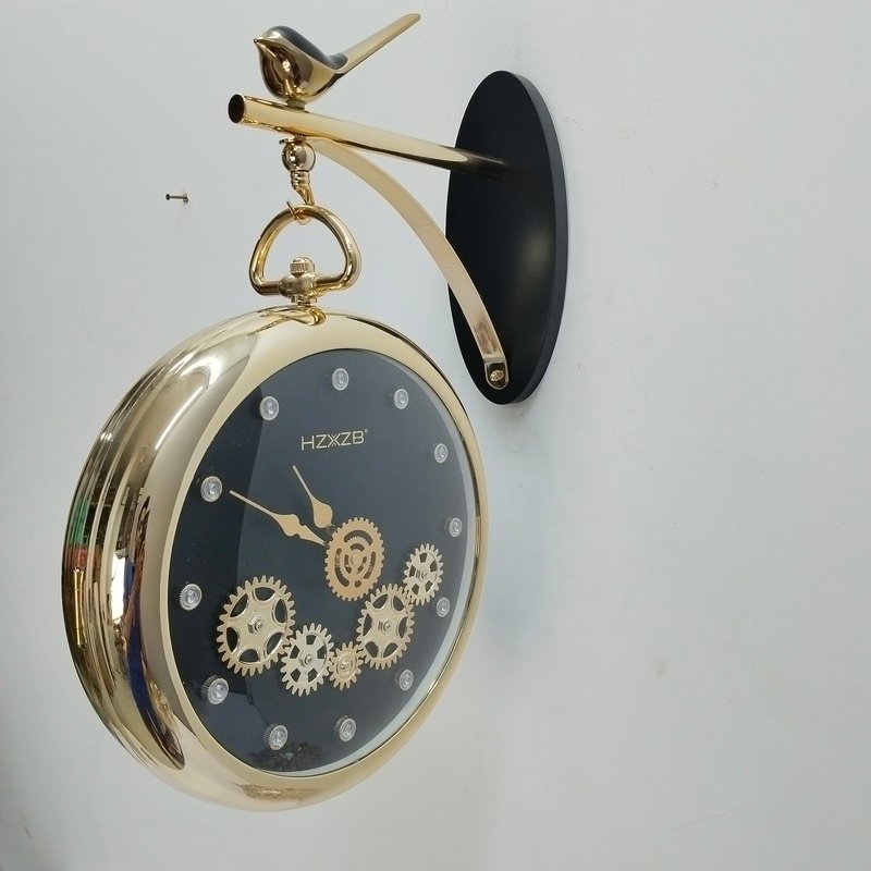 luxury vintage gold hanging station wall clock with bird motif and gear dial luxury vintage gold hanging station wall clock with bird motif and gear dial