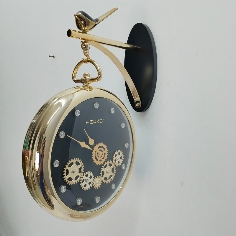 luxury vintage gold hanging station wall clock with bird motif and gear dial luxury vintage gold hanging station wall clock with bird motif and gear dial