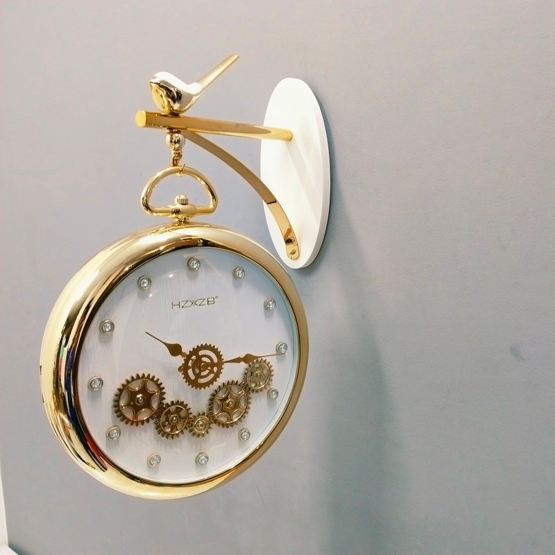 luxury vintage gold hanging station wall clock with white dial and bird motif luxury vintage gold hanging station wall clock with white dial and bird motif