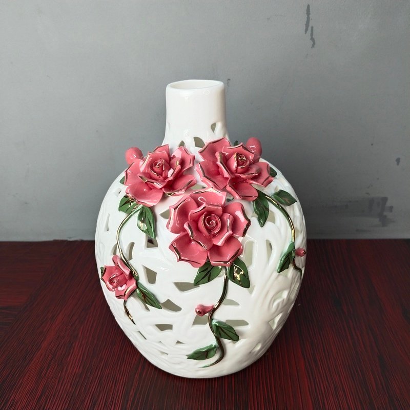 elegant white openwork porcelain vase with 3d pink roses elegant white openwork porcelain vase with 3d pink roses