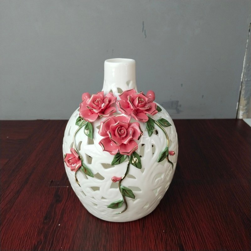 elegant white openwork porcelain vase with 3d pink roses elegant white openwork porcelain vase with 3d pink roses