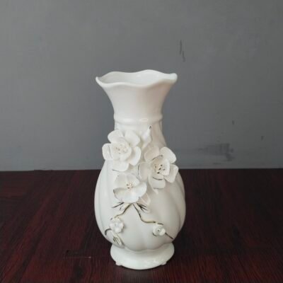 Elegant White Ceramic Flower Vase with 3D Floral Relief elegant white ceramic flower vase with 3d floral relief
