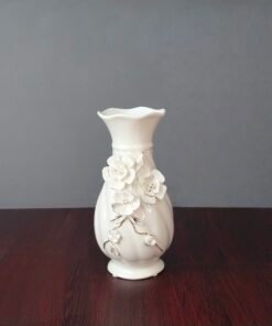 elegant white ceramic flower vase with 3d floral relief