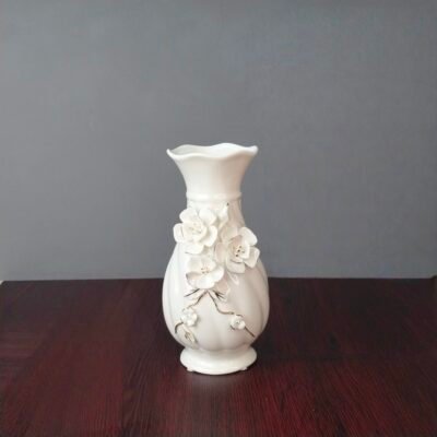 Elegant White Ceramic Flower Vase with 3D Floral Relief elegant white ceramic flower vase with 3d floral relief