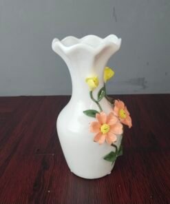elegant white ceramic flower vase with 3d floral design