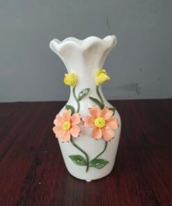 elegant white ceramic flower vase with 3d floral design