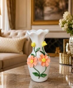 elegant white ceramic flower vase with 3d floral design