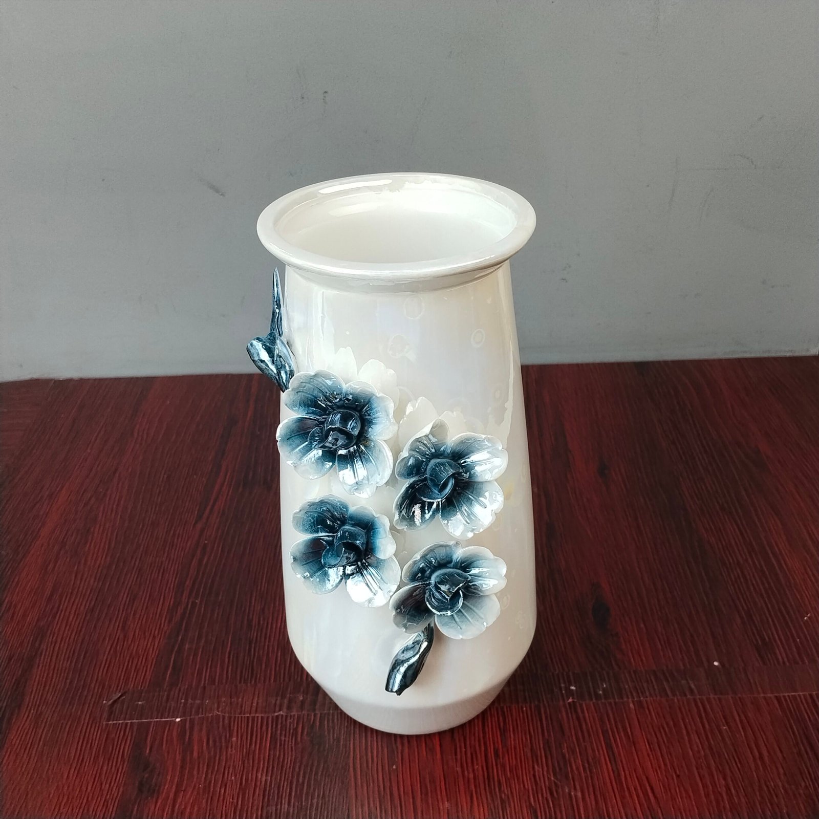 Ceramic Flower Vase with 3D Blue Floral Accents Ceramic Flower Vase with 3D Blue Floral Accents