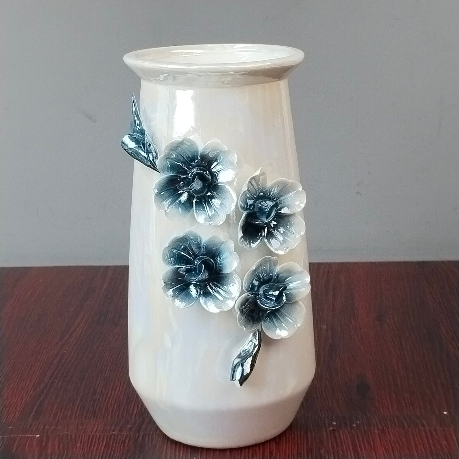 Ceramic Flower Vase with 3D Blue Floral Accents Ceramic Flower Vase with 3D Blue Floral Accents